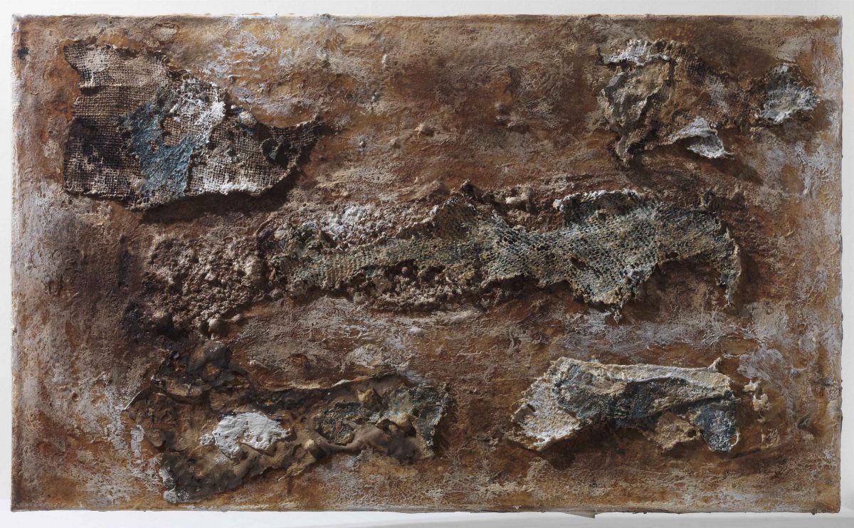 Mixed media on canvas:  Burned  materials  -textiles-  resins-  and plastic. Dimensions 70X42.