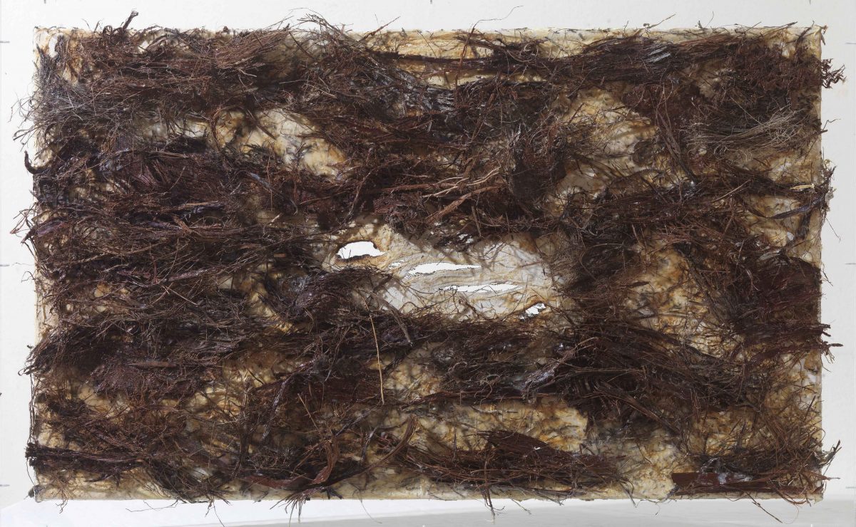 Mixed media on canvas:   Wood sticks of palm tree and burned resins. Dimensions 70X42.